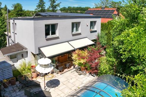 Exklusives Mehrfamilienhaus mit Ateliercharakter, Einliegerwohnung und Pool