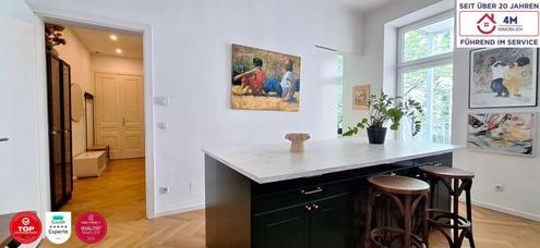Wohnen mit Klasse: sanierter Altbau, Fischgrätparkett & 16 m² Freifläche