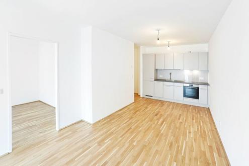 ab Jänner 2027: GEKÜHLTE ESTLICHE GROSSE 2 ZIMMER NEUBAUWOHNUNG MIT FREIFLÄCHE in den INNENHOF