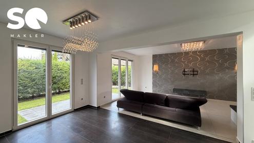 # SQ -EXKLUSIVE DOPPELHAUSH�LFTE MIT GARTEN & TERRASSE - GROSSZ�GIGES WOHNEN IN 1220 WIEN