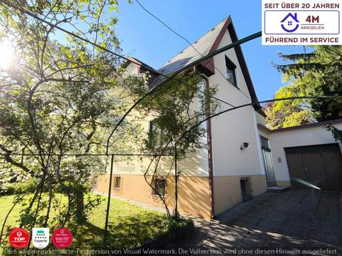 Au�ergew�hnliches Einfamilienhaus mit Geschichte, gro�z�gigem Raumangebot, besonderem Charakter und park�hnlichem Garten.