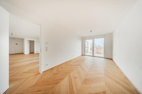 Exklusiver Neubau Erstbezug - 4 Zimmer mit Balkon, Grünblick, Fitness & Garage 