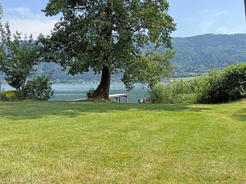 Sonnige Gartenwohnung mit privatem Seezugang