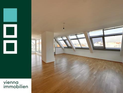 Moderne Dachgeschosswohnung mit großzügigen Außenflächen