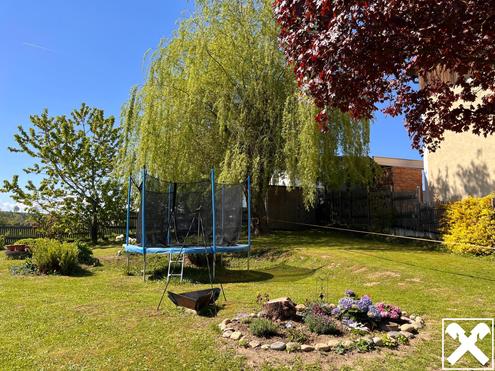 Mehr als nur ein Haus - Platzwunder mit Gartenidylle