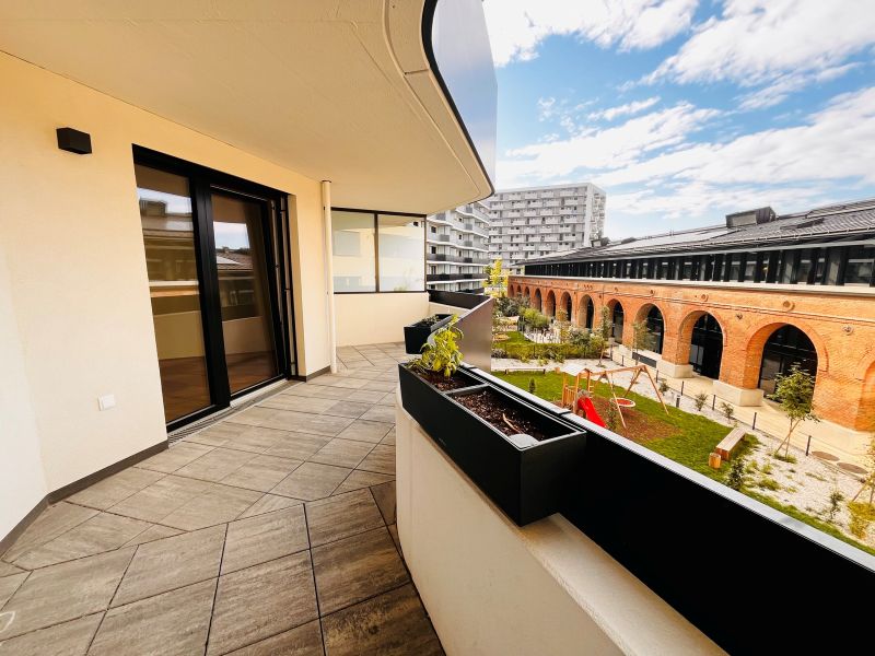 EXKLUSIVER ERSTBEZUG nahe Hauptbahnhof - Sonnige Wohnung mit grozgiger Freiflche und Kche in einem modernen Neubauprojekt