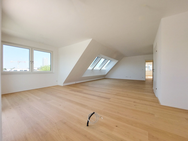 Nur 450m von der Alten Donau entfernt spielt dieses 3-Zimmer Dachgeschosswohnung alle Stücke / / 1220 Wien / Bild 2