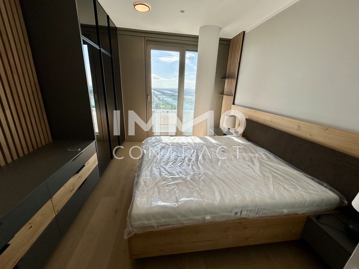 Mbliertes Apartment im 42. Stock mit Weitblick auf die Donau! Pool, Spa und Fitness inklusive! /  / 1220 Wien / Bild 0