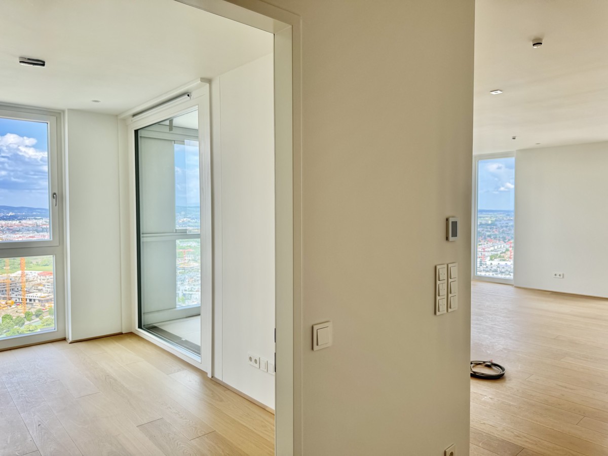 Stadtleben mit Weitblick: 3 Zimmer Hochhauswohnung zum Verlieben - Provisionsfrei - U1 und Donauzentrum vor der Tre! /  / 1220 Wien / Bild 2