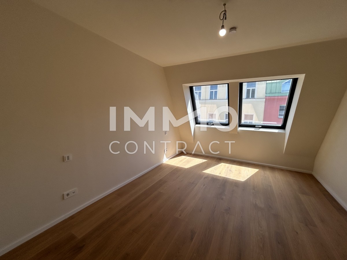 Lichtdurchflutete 2-Zimmer-Dachwohnung mit sonniger Loggia-ERSTBEZUG /  / 1040 Wien / Bild 6
