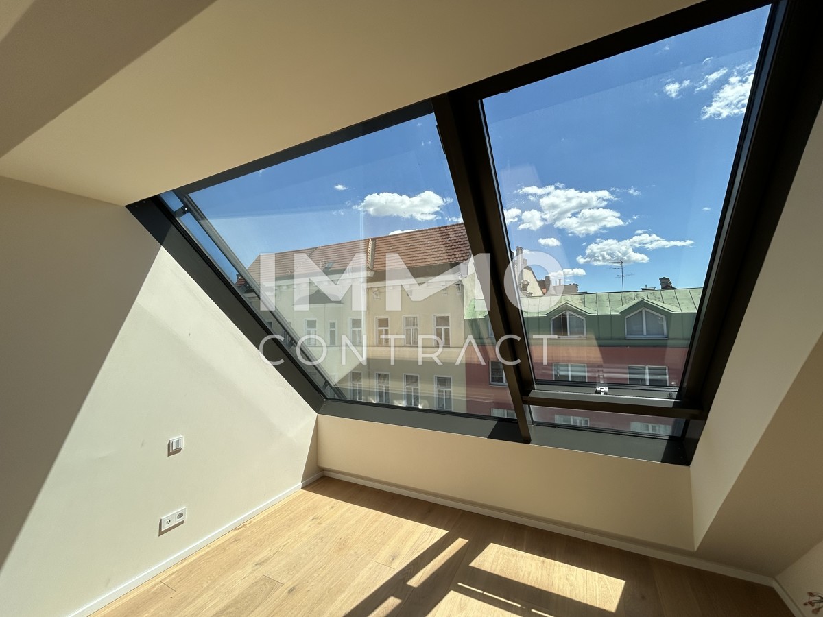 Erstbezug! 3-Zimmer-Dachgeschosswohnung mit traumhafter Wien-Aussicht /  / 1050 Wien / Bild 2