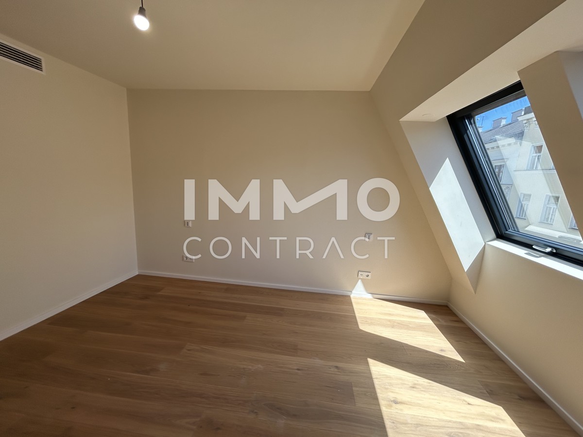 Lichtdurchflutete 2-Zimmer-Dachwohnung mit sonniger Loggia-ERSTBEZUG /  / 1040 Wien / Bild 7