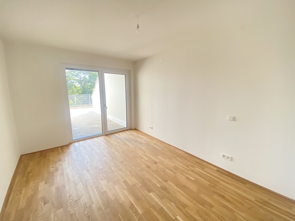 Townhouse - 3 Zimmer Gartenwohnung +  2 Bder - ERSTBEZUG = DAS LAURENZ = 2 bedroom apartment+garden /  / 1110 Wien / Bild 6