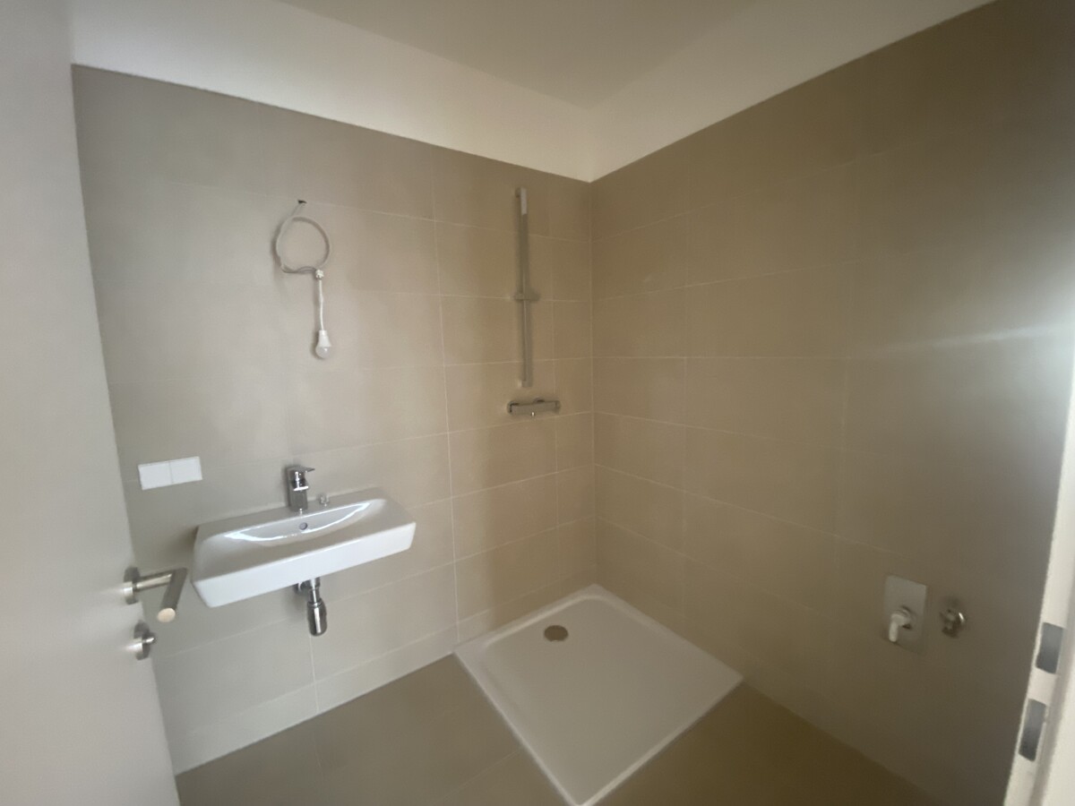 Townhouse - 3 Zimmer Gartenwohnung +  2 Bder - ERSTBEZUG = DAS LAURENZ = 2 bedroom apartment+garden /  / 1110 Wien / Bild 4