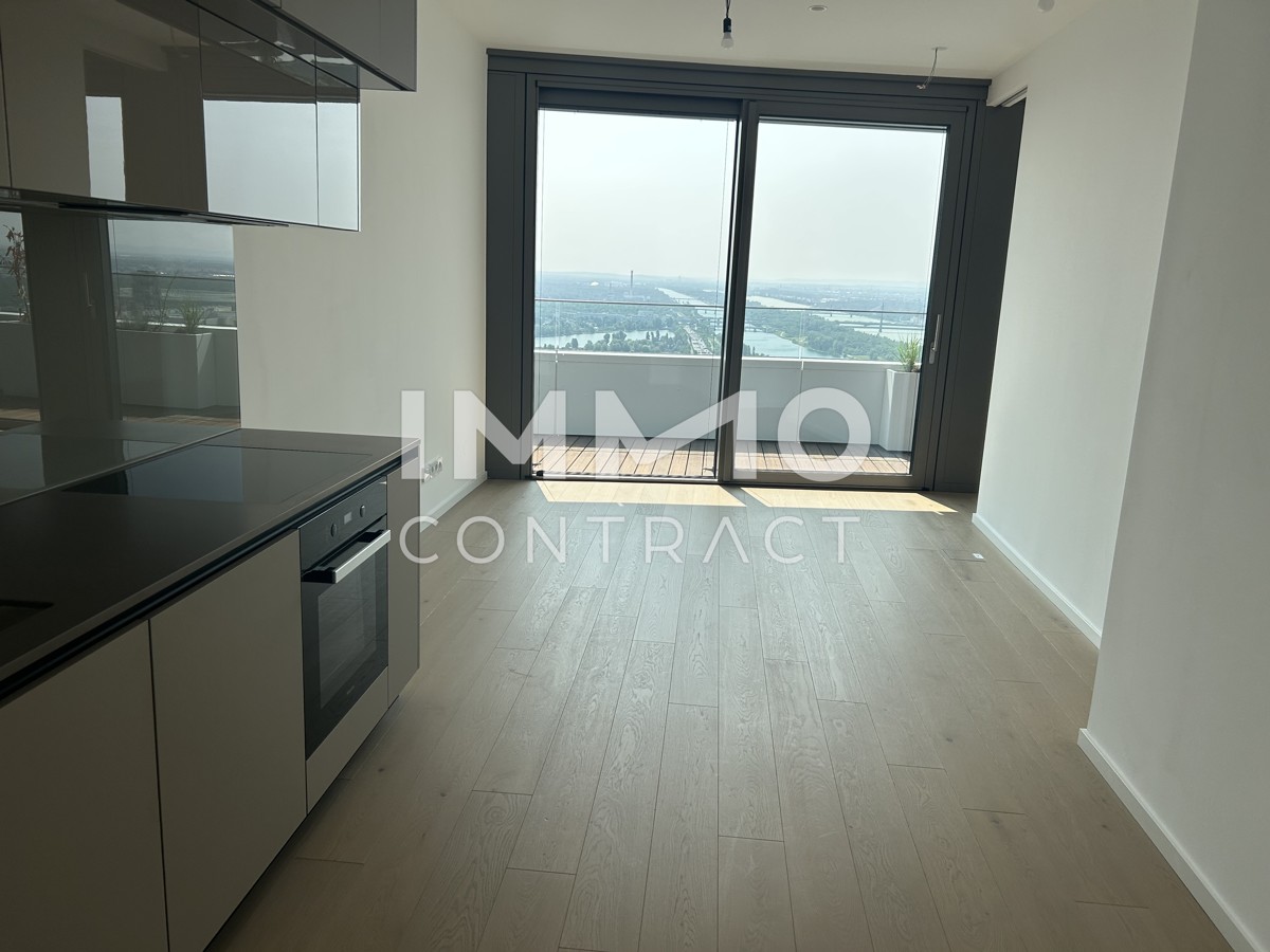 2 Zimmer Erstbezug mit atemberaubenden Blick auf die Donau! Pool, Sauna, Gym inklusive! /  / 1220 Wien / Bild 1