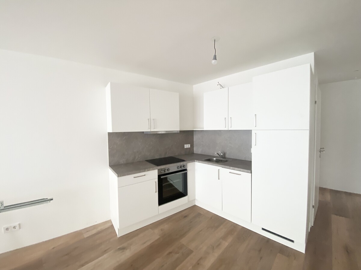 U3 ! Inklusive Küche 2 Zimmer Wohnung+Loggia =DAS LAURENZ= Erstbezug - 1 Bedroom+ Loggia / / 1110 Wien / Bild 4