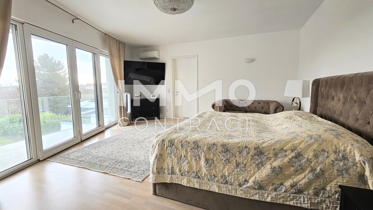 Zeitlose Architektur trifft Großzügigkeit - Designvilla mit Indoor-Pool und Einliegeroption / / 2511 Pfaffstätten / Bild 9