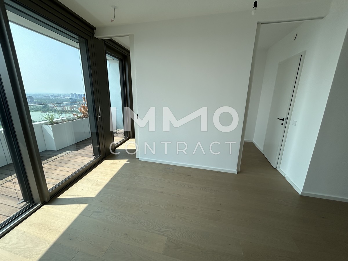 2 Zimmer Erstbezug mit atemberaubenden Blick auf die Donau! Pool, Sauna, Gym inklusive! /  / 1220 Wien / Bild 2