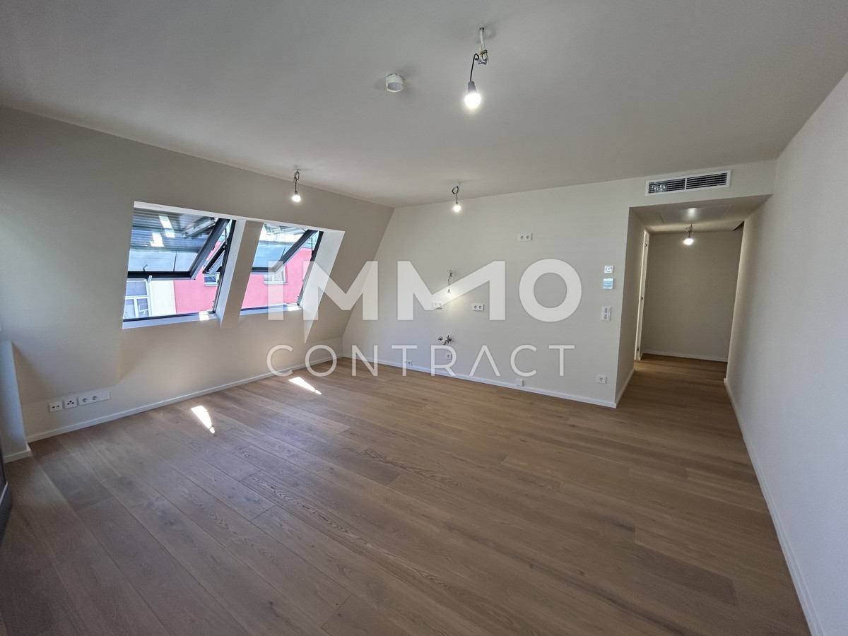 Lichtdurchflutete 2-Zimmer-Dachwohnung mit sonniger Loggia-ERSTBEZUG /  / 1040 Wien / Bild 4