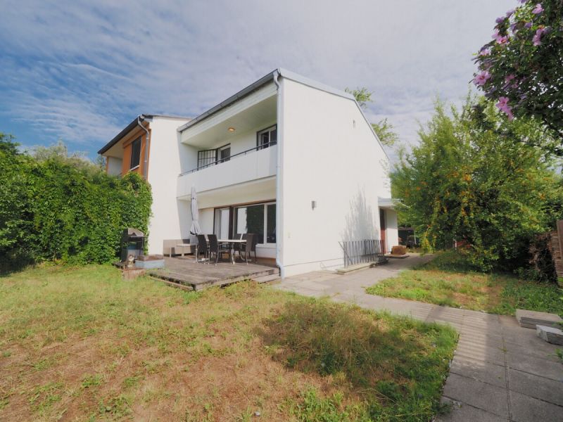 Wohnen in der beliebten Tirolerhofsiedlung - Eckreihenhaus mit großem Garten auf Eigengrund!