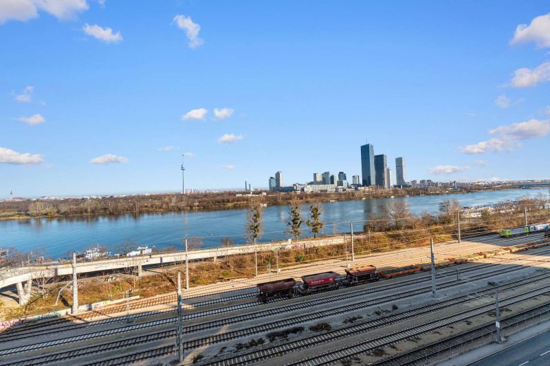 Hochwertige Dachgeschosswohnung mit Donaublick, großer Wohnküche, Klimaanlagen & 4 Zimmern / / 1020 Wien / Bild 5