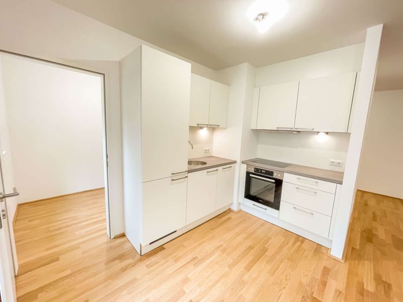 Moderne 2,5-Zimmer-Neubauwohnung mit Balkon in zentraler Ruhelage