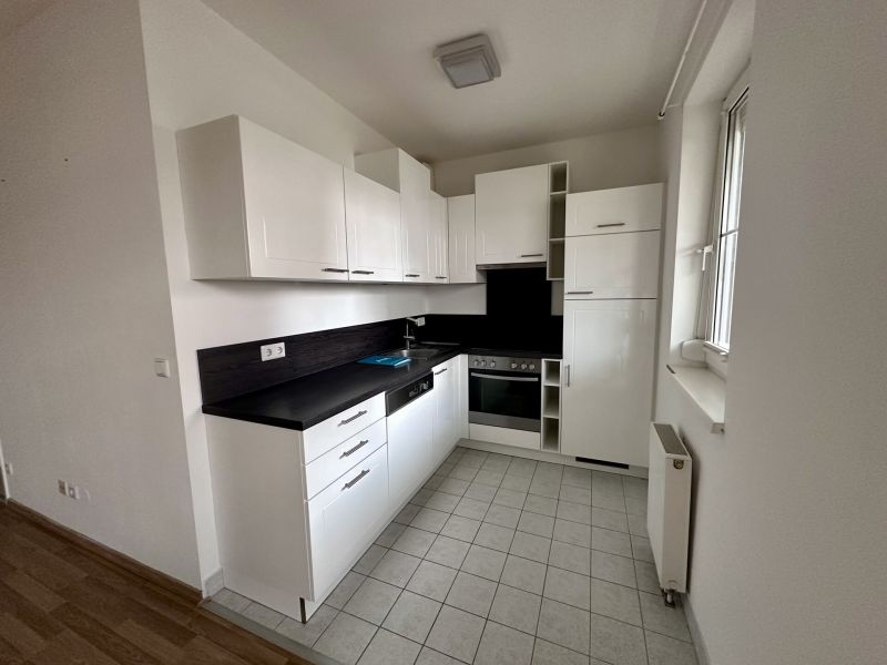 Starterwohnung im Zentrum mit Garten und Tiefgaragenstellplatz!