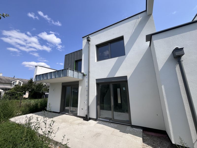 Traumhafte Doppelhaushlfte in Guntramsdorf: Erstbezug mit Garten und 2 Stellpltzen!