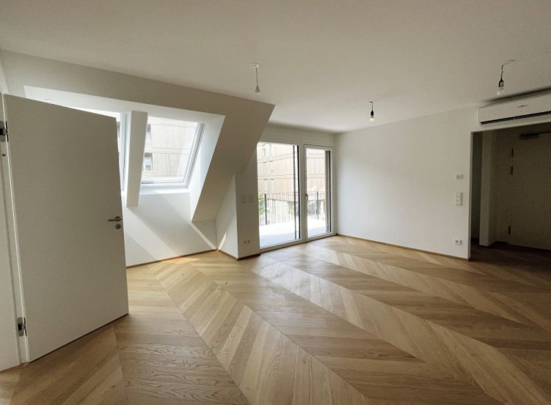 Moderne Zwei-Zimmer-Wohnung im 1. Dachgeschoss mit klarer Architektur und besonderem Wohnambiente zu kaufen in 1130 Wien /  / 1130&nbsp;Wien / Bild 2