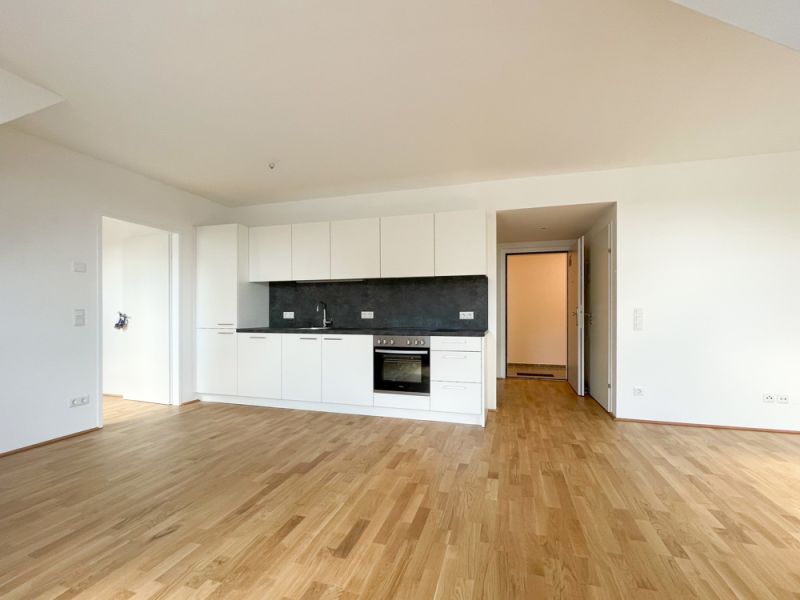 AB AUGUST: TRAUMHAFTE DACHGESCHOSS-WOHNUNG - OFFENE WOHNKCHE - BLICK IN DEN INNENHOF - TOP NEUBAU /  / 1220 Wien / Bild 2