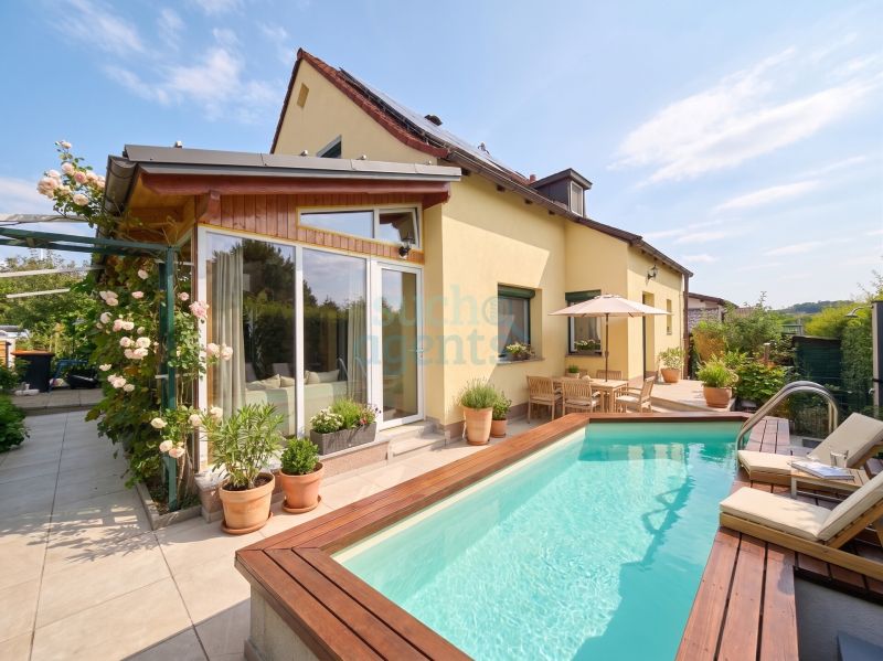 Preisupdate! Einziehen & Wohlfühlen | Modernisiertes Haus mit PV, Wärmepumpe & beheiztem Pool
