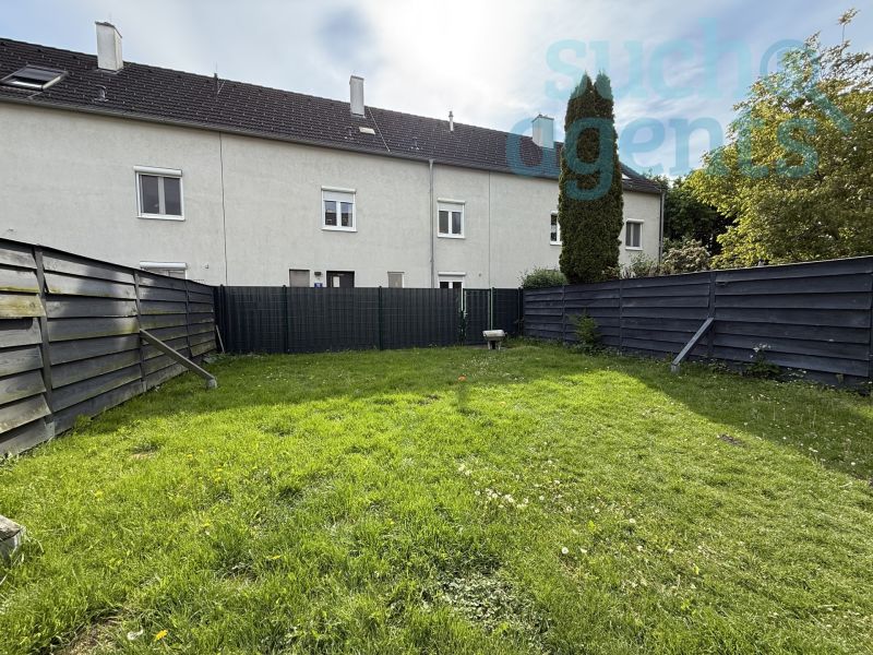 Reihenhaus mit groem Garten, Garage und vollunterkellert in ruhiger Lage /  / 4600 Wels / Bild 1